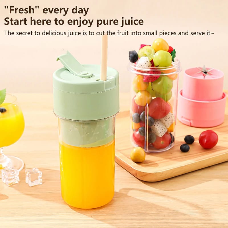 Portable juicer blender cup with straw, green lid and yellow bottle body